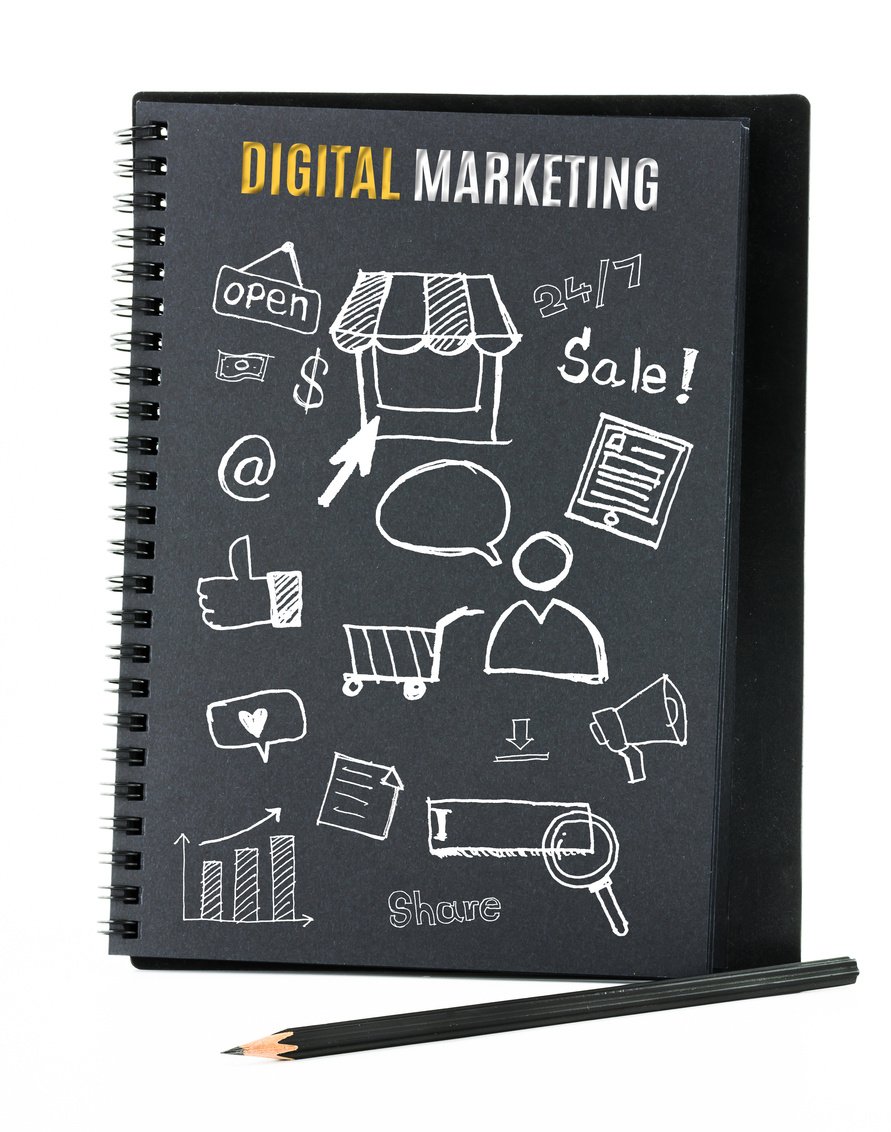 Notebook on desk with icon relate with Digital Marketing